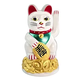 Кішка Манэки-неко махає лапою