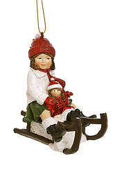 Ялинкова іграшка Дівчинка на санчатах 10.5 см