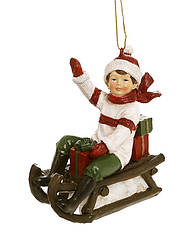 Ялинкова  іграшка Мальчик на санчатах 10.5 см