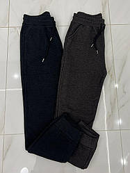 Жіночі утеплені трикотажні джогери в двох кольорах - темно-сірий та коричневий меланж. Розміри 46-52