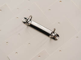 Затискачі для блокнотів канцелярські. Колір "Срібло". 125х30мм. Кільце 35мм