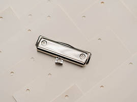 Затискачі канцелярські для блокнотів і паперу. 100х30мм