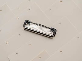 Затискачі для блокнотів і канцелярських папок. Колір "сріблястий" 100х30мм