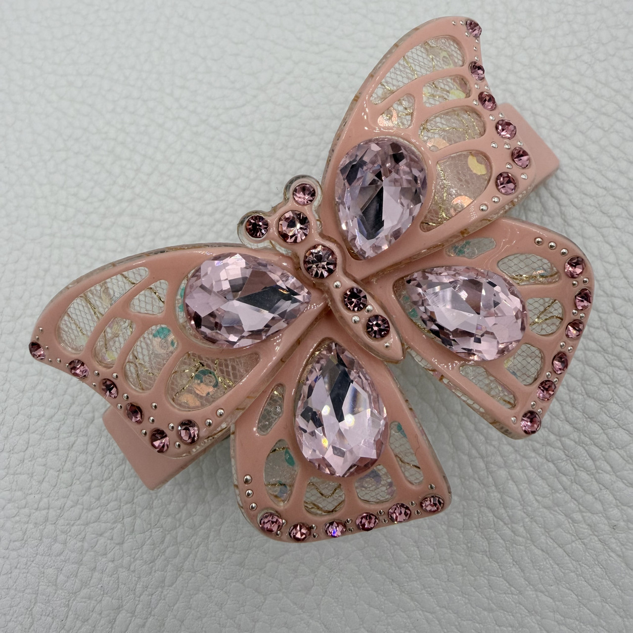 Заколка автомат для волос глянцевая бабочка розового цвета с переливающимися кристаллами размер 9х5 см