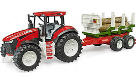 Іграшка Bruder Трактор Roadmax з причепом та колодами (03453)