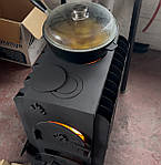 Буржуйка, на якій можна готувати — тепло і зручність в одному.