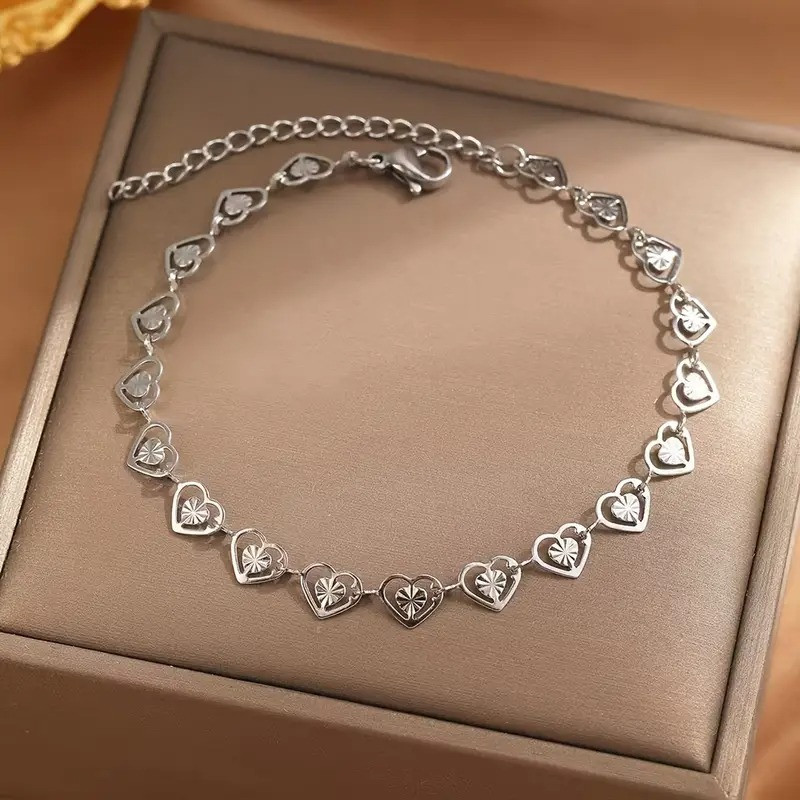 Браслет сріблястий з нержавіючої сталі у вигляді вирізаних сердечок LumenManus для жінок 17+5 см 6мм OrnatusDivinus947, фото 1