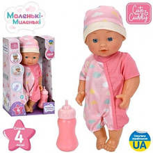 Пупс M 6185 I UA п'є-пісяє пляшечка 4 пісні муз. (укр.) бат. (табл.) кор. 19-31-10 см.