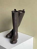 Високі чоботи на блискавці