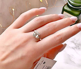 Колечко з білими цирконами у формі дитячої ніжки Карапуз