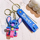 Брелок Disney Lilo & Stitch — синій Стіч на триколісному велосипеді з жуйкою