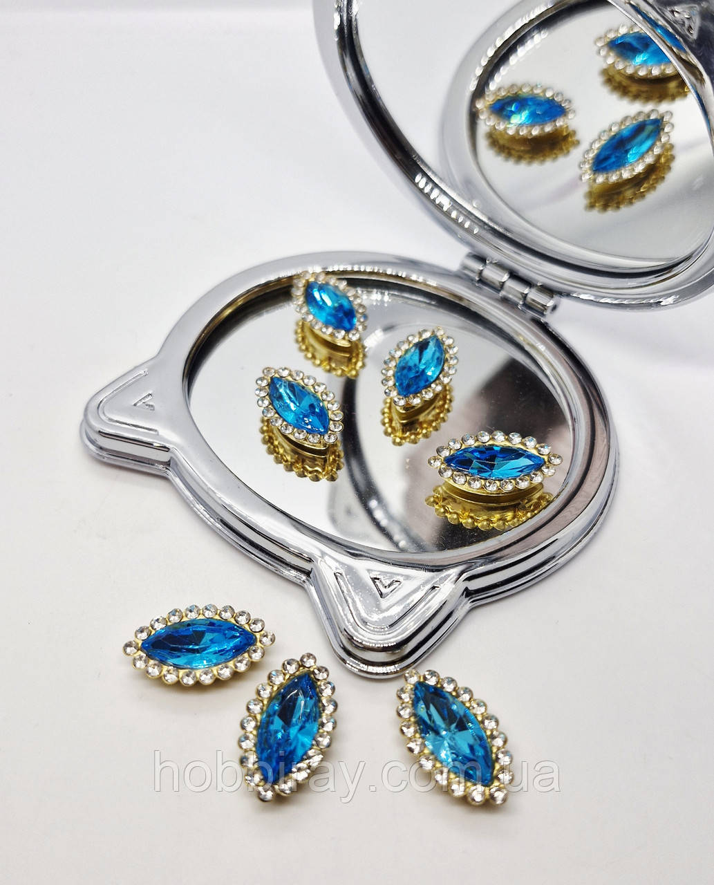 Стразовий декор. 2*1,2см. Скло , метал. Пришивні. 1шт. Колір блакитний., фото 1