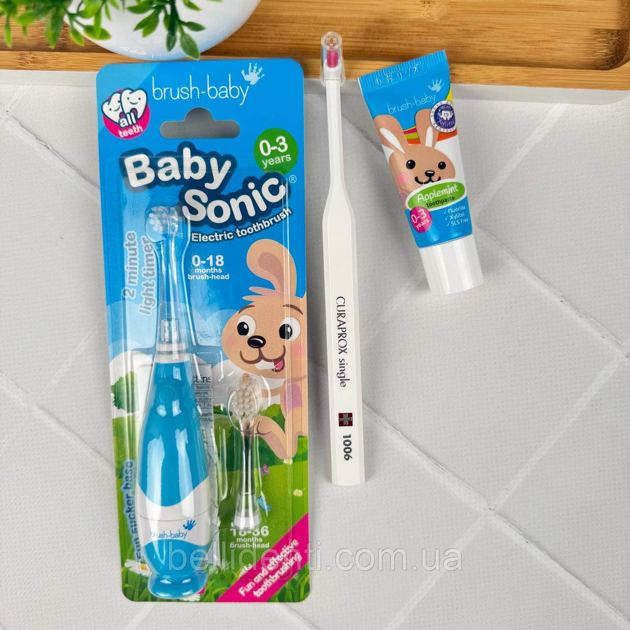 Набір для перших зубів від 0 до 3 років (паста Brush-Baby зайчик, 12 мл+монопучкова щітка Curaprox 1006, електрична щітка