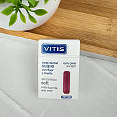 Зубна нитка VITIS вощена з фтором і м’ятою, розпушуюча (рожева), 50 м – прозора упаковка, ефективне очищення міжзубних проміжків