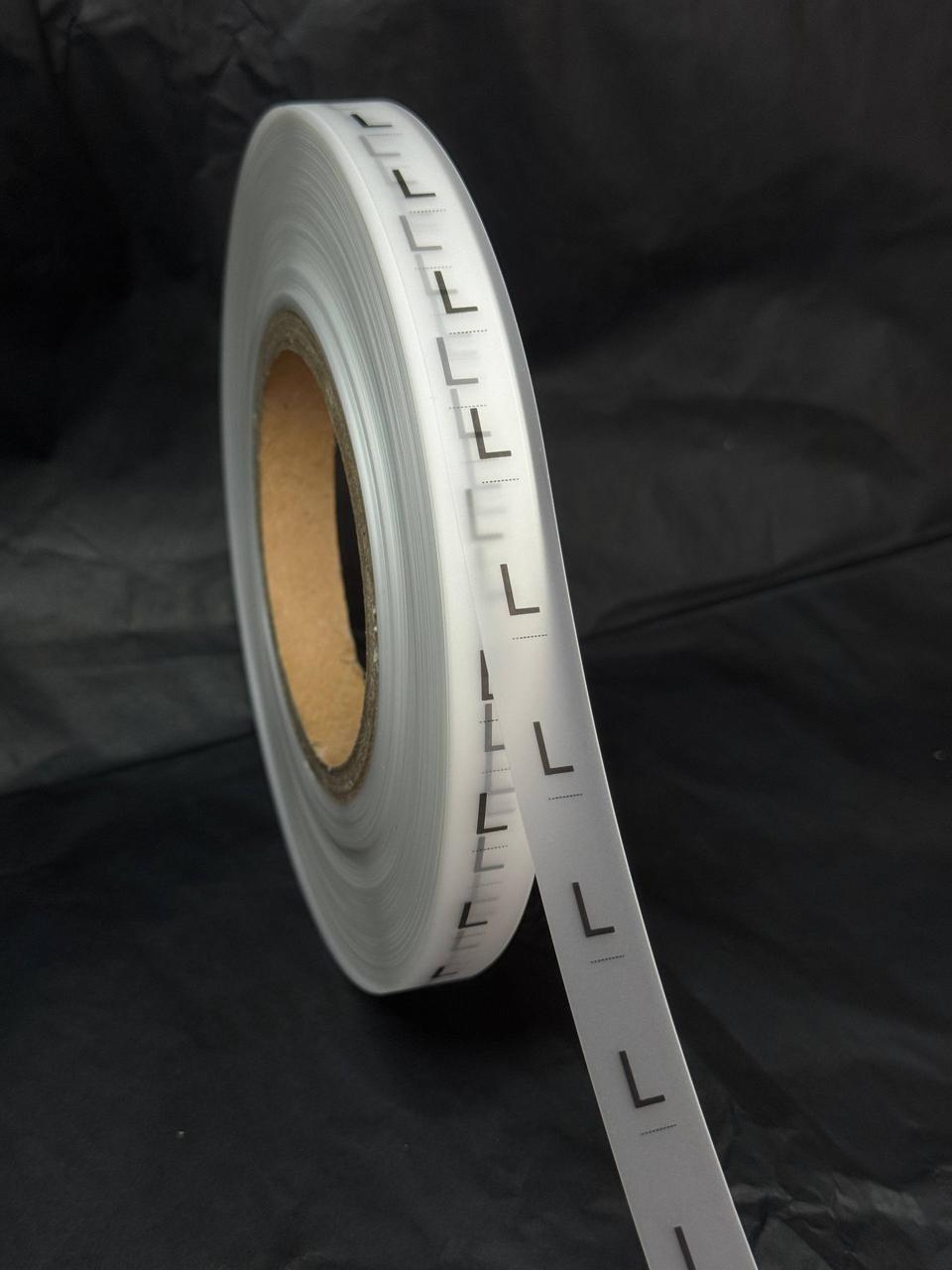 Комплект бірок L силіконових для одягу Напівпрозора матова біла стрічка 15 мм, 68 м, фото 1