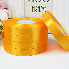 Стрічка атласна однотонна 1,2 см, №112 насичений жовтий (рулон 33 м)