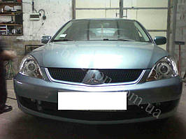 Установка биксеноновых линз G5 с масками 2.8 на Lancer 9