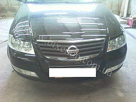 Установка биксеноновы линз G5 с глазами с покраской накладок на Nissan Almera 1