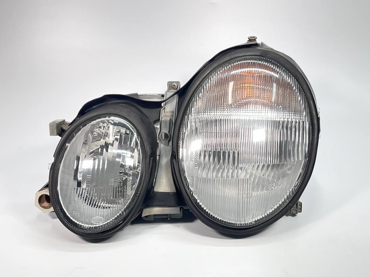 Фара передня ліва Mercedes CLK W208 A2088200161 Hella, фото 1