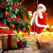 Інтерактивний Санта, що піднімається по мотузці — музичний новорічний декор, 22 см