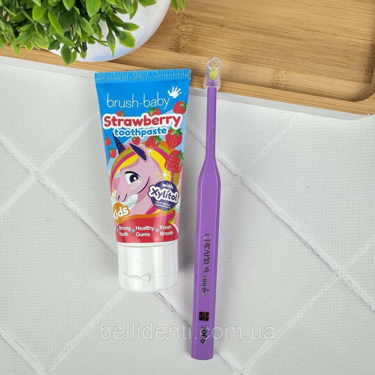 Набір для дітей від 3 до 12 років (зубна паста Brush-Baby єдиноріжка, 50 мл+монопучкова щітка Curaprox 1006, фіолетова), фото 1