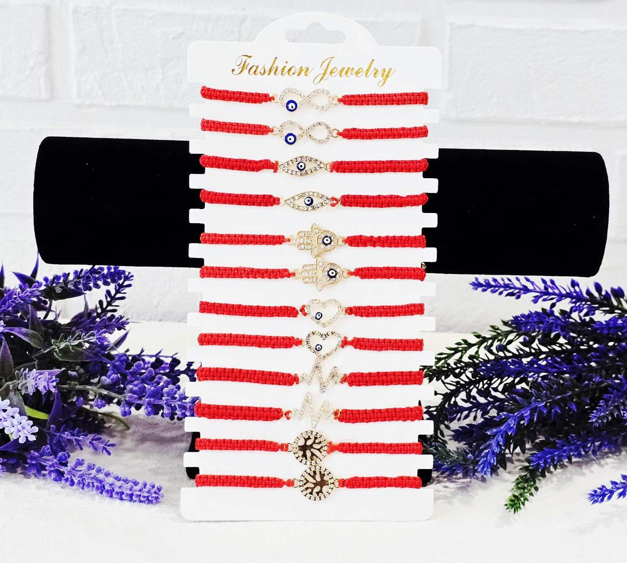 Браслет оберіг червона нитка з різними кулонами(золоті)