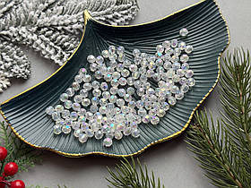 Намистини "Грані" 0.8 см прозорого кольору з переливом 50 гр