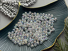 Намистини 0.8 см прозорого кольору з переливом 50 гр