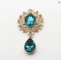 Камінь з підвісом в ажурній золотій оправі темна бірюза 2,6*4,6 см