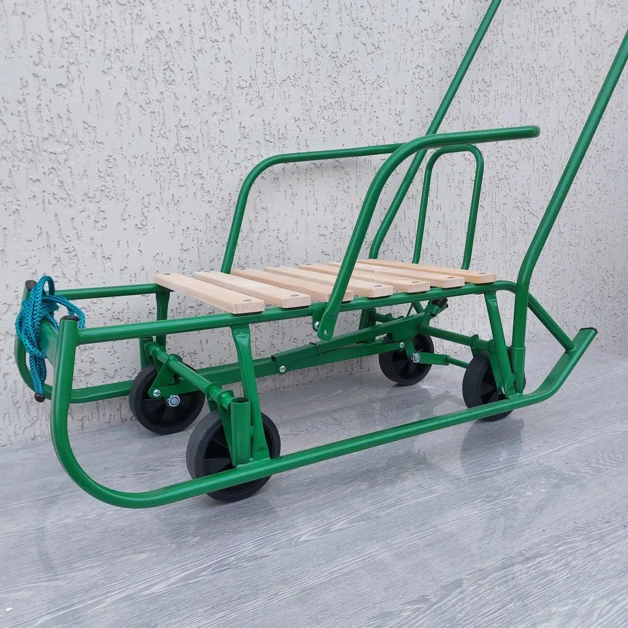 Дитячі санки Baby Elit із висувними колесами, комфортною спинкою та складною ручкою. Зимові санчата зеленого кольору., фото 1