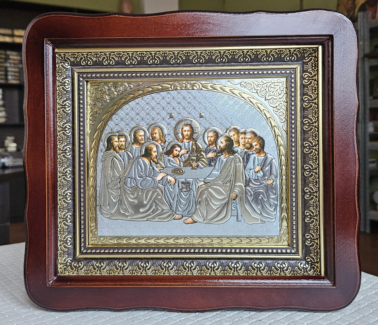 Ікона Таємна Вечеря під срібло в  темному фігурному дерев'яному кіоті під склом,  розмір кіота 26*23,лік 15*18, фото 1