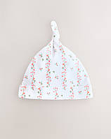 Дитяча шапочка NEXT  з вузликом для новонароджених 0-3  місяців, 1шт (білий квіти)
