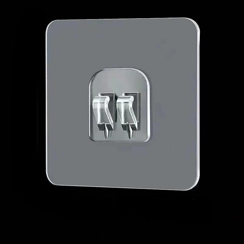 Настінний тримач, самоклеючий з подвійним гачком для кріплення сітчастих полиць, кошиків тощо, 6*6 см, прозорий