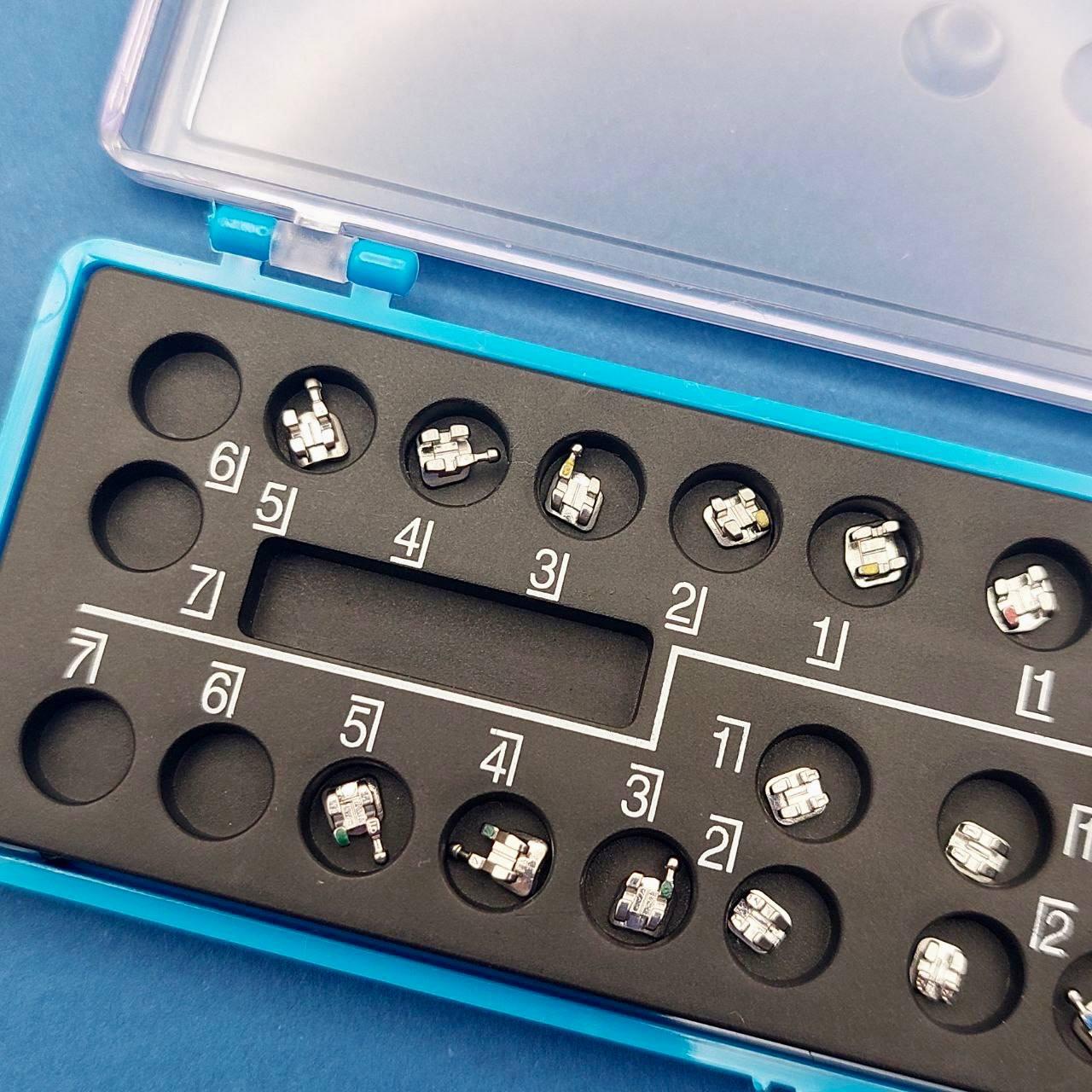 Брекети металеві Galaxy, Creative