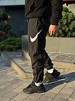 Нейлонові штани від бренда Найк Чоловічі нейлонові штани найк свуш Чорні штани Найк нейлон свуш