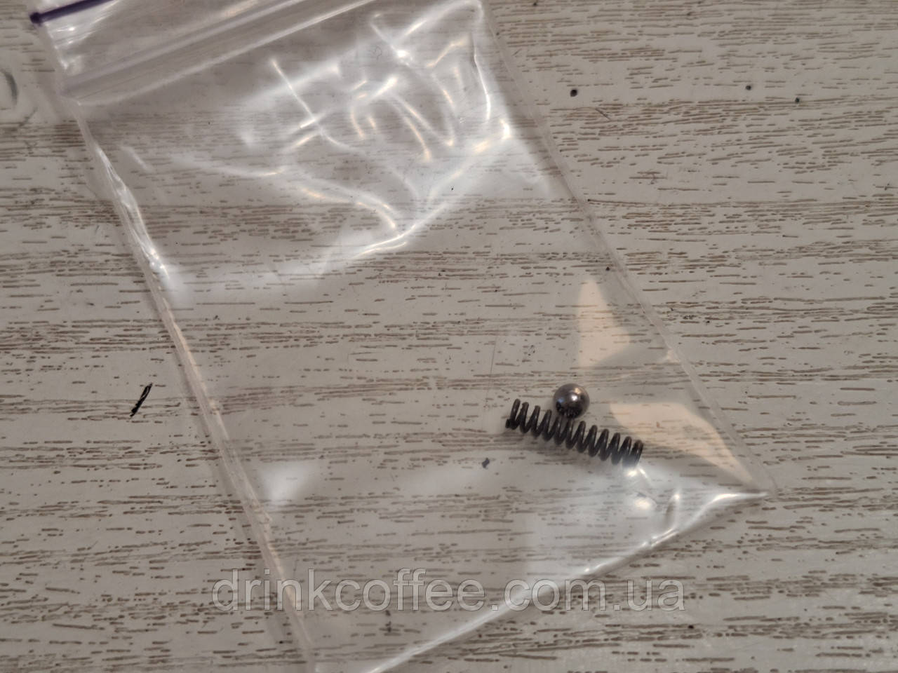 Пружинка і шарик для кільця регулювання помолу кавомолки Запчастина для кавомашини Miele CM6350 б/у, фото 1