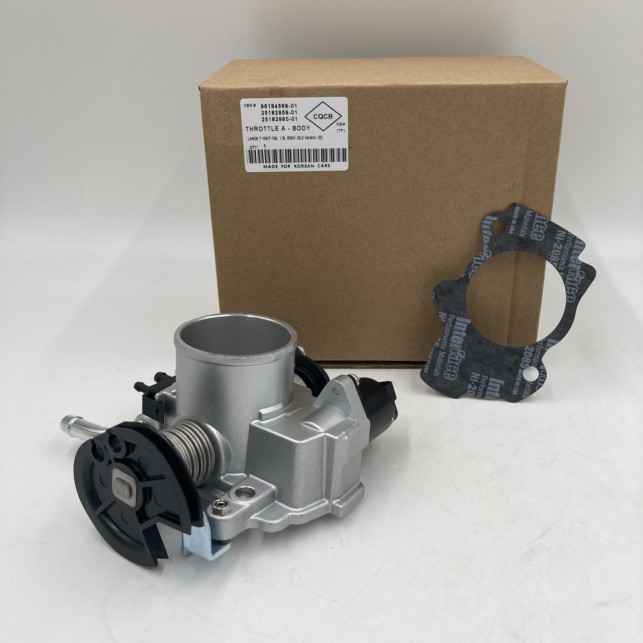 Дросельна заслінка Ланос 1,5 (Євро 2) з прокладкою Grog Корея 25182959, 25182960, 96184569, 96184568