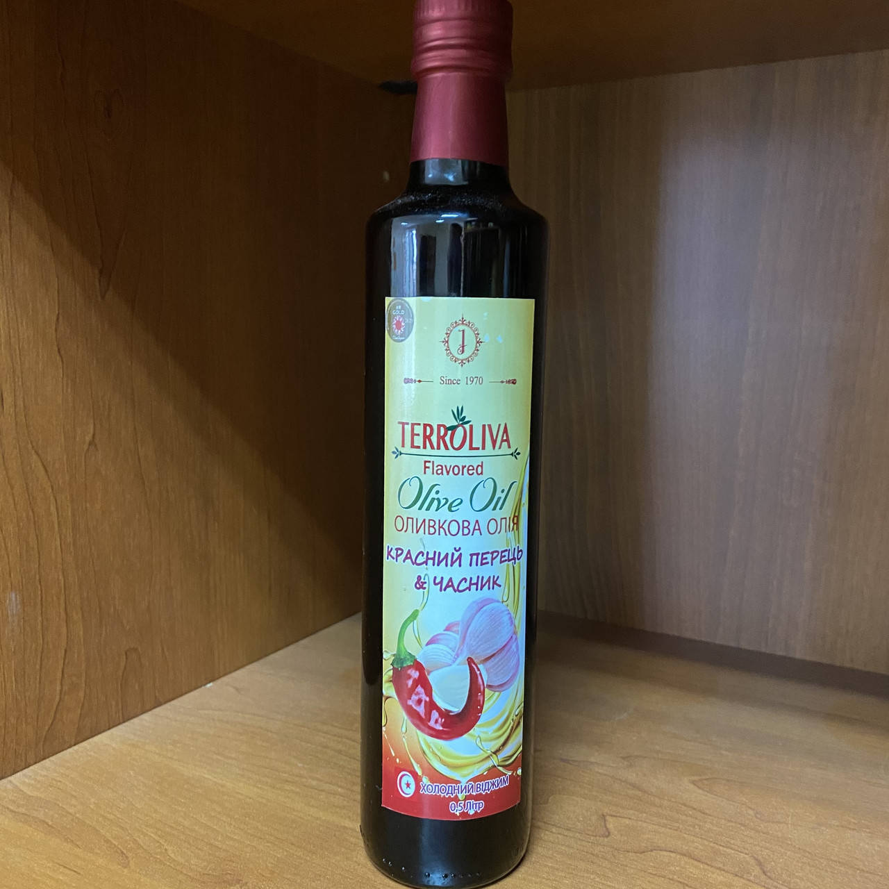 

Масло оливковое ароматизированное "Красный перец и чеснок" 0,5л Terroliva (Тунис)