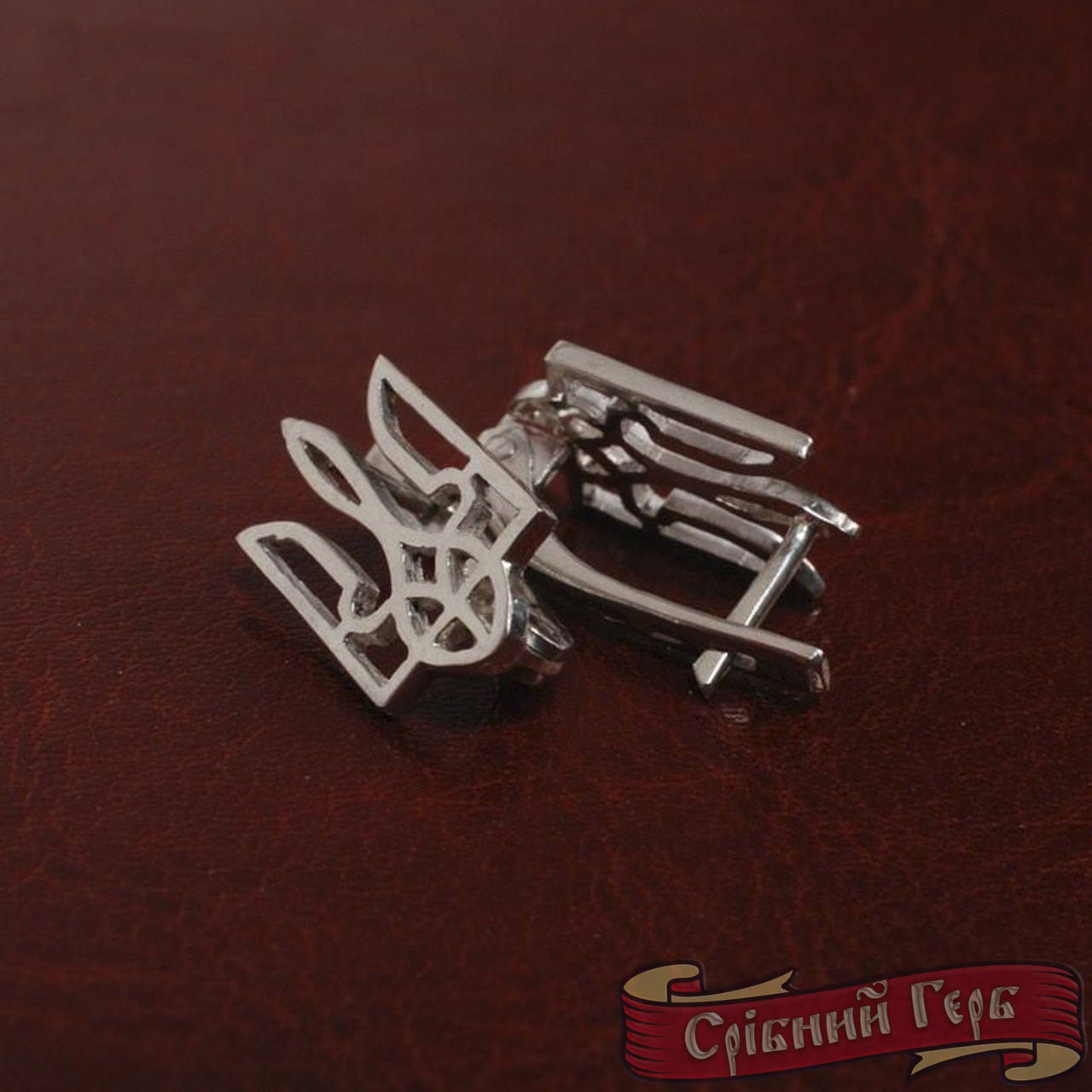 

Срібні сережки тризуб