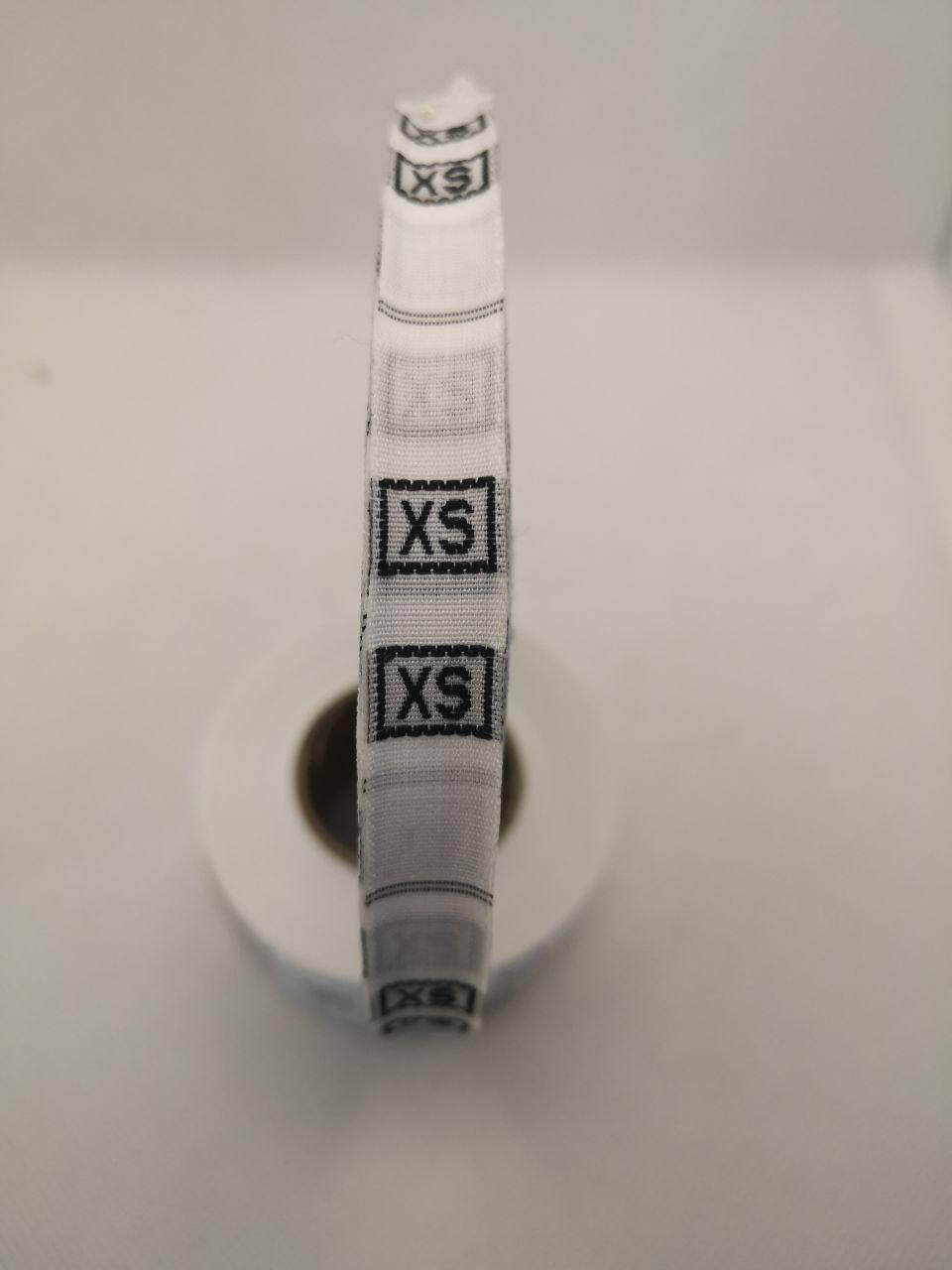 

Размерник Джккард вышитый пришевной тканевой № XS (в упаковке 1000 штук) Турция, Белый