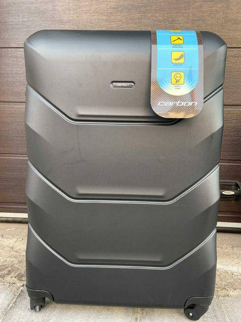 

Чемодан CARBON 147 АБС-пластик,  графитовый М, Серый