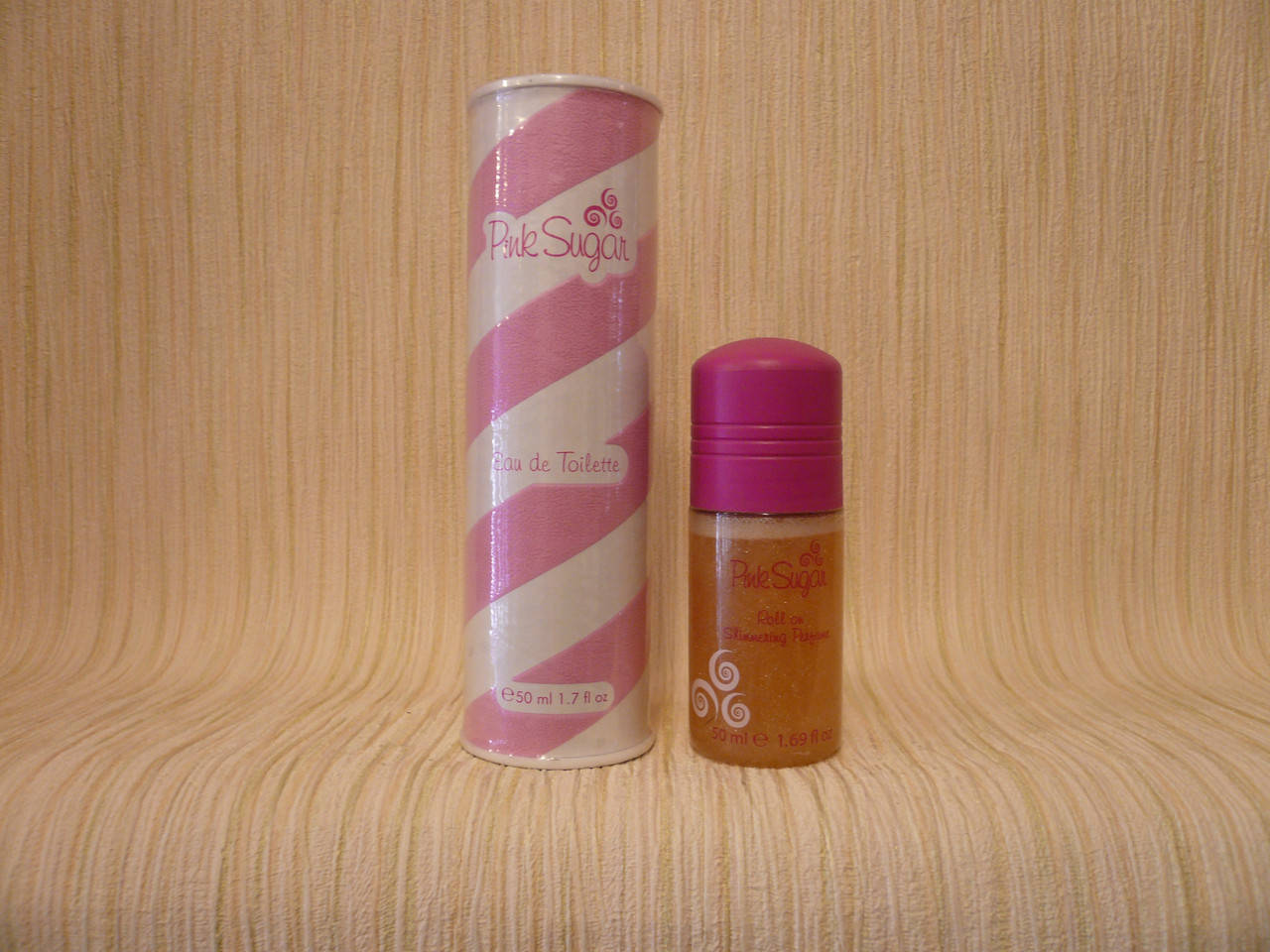 

Aquolina - Pink Sugar (2004) - Дезодорант шариковый с блестками 50 мл