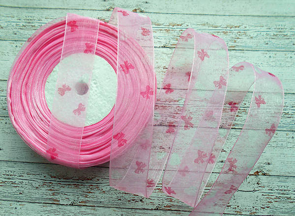 

Стрічка органза 2,5см., рожева з бантиком