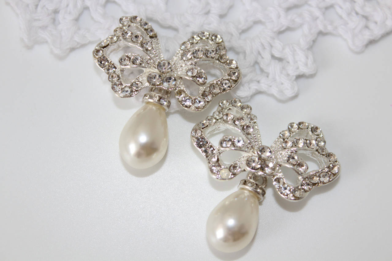 

Стразовая серединка "Бантик с жемчужиной", цвет серебряный, 30 мм*37 мм