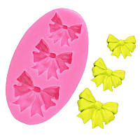 Молд силіконовий Бантики 50 на 85 мм рожевий