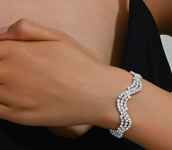 Жіночий браслет сріблястий із стразами, фото 1