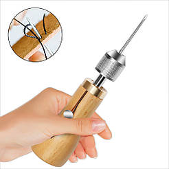 Шило для шкіри з котушкою й нитками