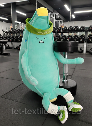 М'яка іграшка з пледом усередині Банан спортсмен м'ятний 60 см, фото 1