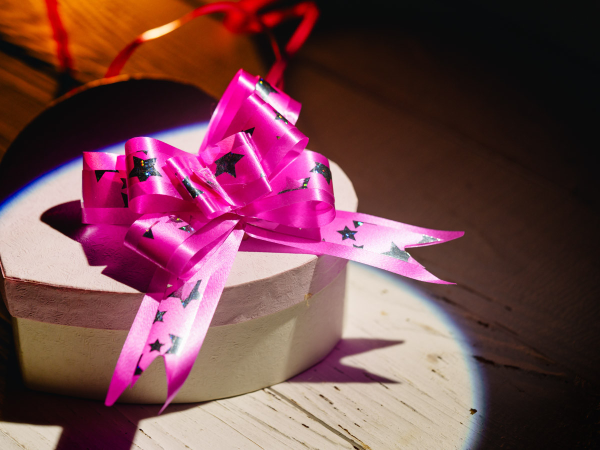 Подарунковий бантик зі стрічки на затяжках для декору та пакування подарунків Колір рожевий. 4х9 см, фото 1