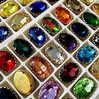 Овал в ажурній золотій оправі Колір Aquamarine Розмір 13х18мм